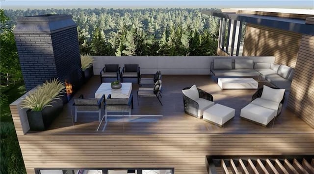 wooden terrace featuring a forest view and outdoor lounge area