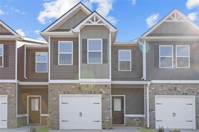 247 Ivey Ter Unit 45, Temple, GA 30179 - townhome / multi-family property featuring board and batten siding, brick siding, and an attached garage
