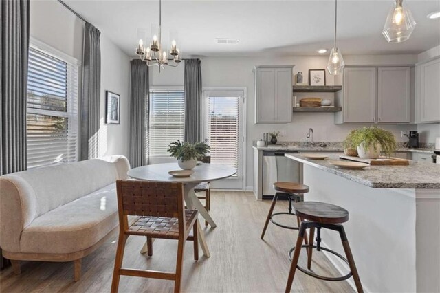 247 Ivey Ter Unit 45, Temple, GA 30179 - kitchen with dishwasher, gray cabinetry, healthy amount of natural light, light wood-style floors, and recessed lighting