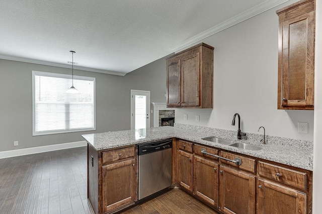 63 Emma Ln, Winder, GA 30680 - kitchen featuring dishwasher, a sink, ornamental molding, a peninsula, and dark wood-style flooring