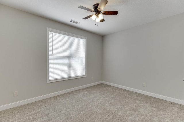 63 Emma Ln, Winder, GA 30680 - unfurnished room with ceiling fan, light colored carpet, and baseboards