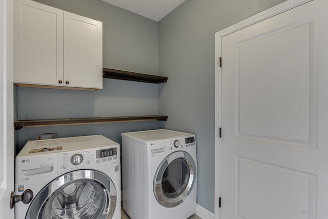 63 Emma Ln, Winder, GA 30680 - washroom featuring washing machine and clothes dryer and cabinet space