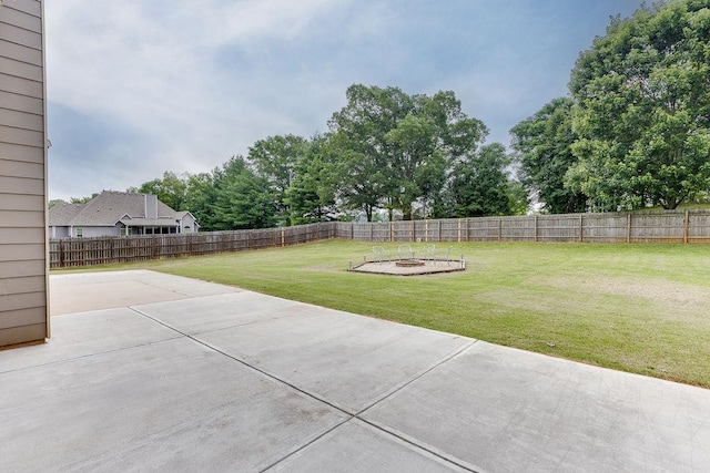 63 Emma Ln, Winder, GA 30680 - view of yard with an outdoor fire pit and a patio