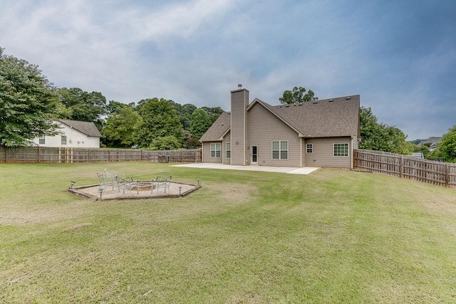 63 Emma Ln, Winder, GA 30680 - view of yard featuring a patio and an outdoor fire pit
