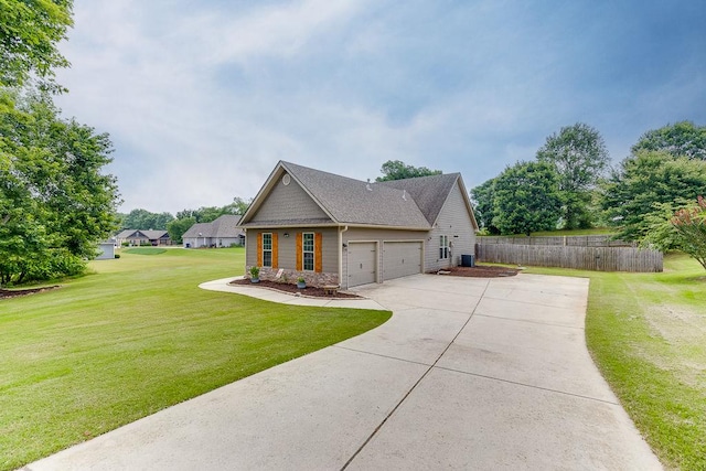63 Emma Ln, Winder, GA 30680 - view of front of property with concrete driveway, an attached garage, cooling unit, and roof with shingles