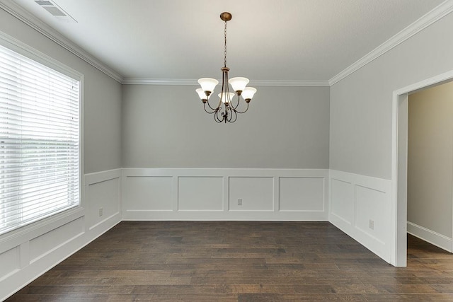 63 Emma Ln, Winder, GA 30680 - unfurnished room with a chandelier, crown molding, dark wood-style flooring, a wainscoted wall, and a decorative wall
