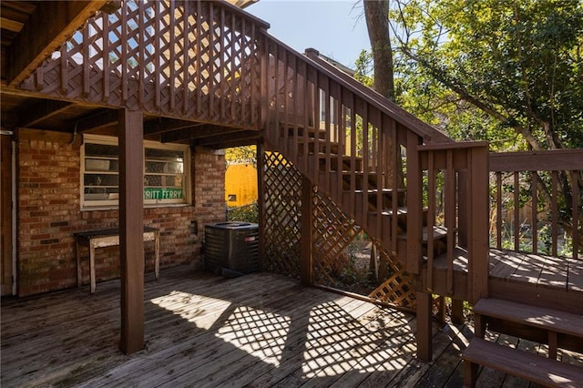 wooden deck with central AC and stairway