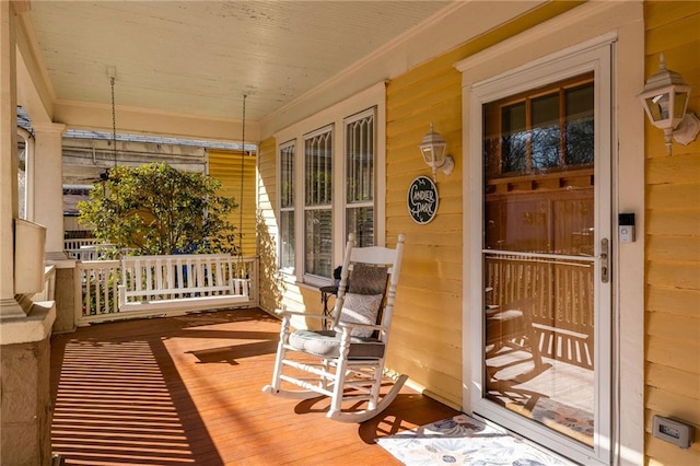 deck featuring a porch