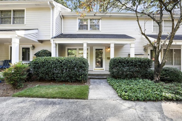 view of property featuring a porch