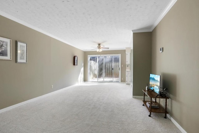 living area with a ceiling fan, baseboards, carpet, and a textured ceiling