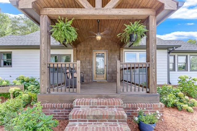 doorway to property featuring ceiling fan