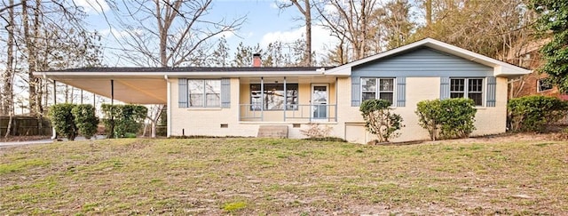 ranch-style home with crawl space, brick siding, a chimney, and a front yard