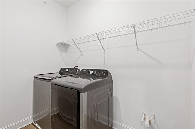 laundry room with washer and dryer