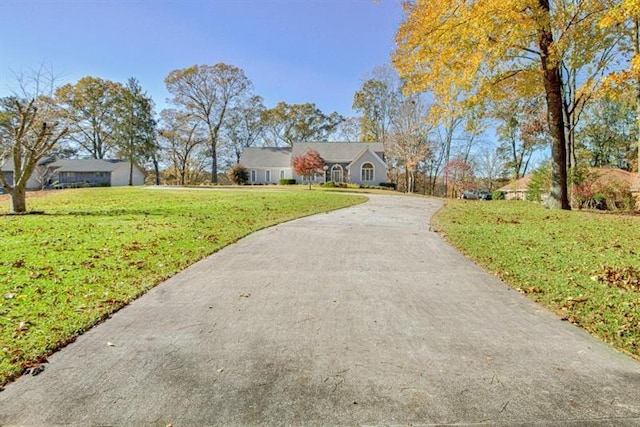 ranch-style house with a front lawn