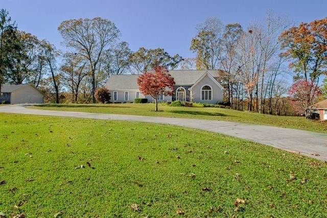 ranch-style house with a front yard