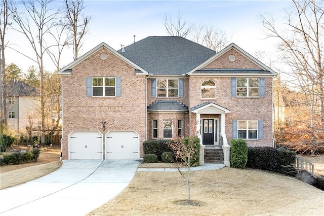 view of front of property featuring a garage