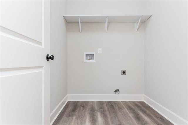 laundry room featuring wood finished floors, baseboards, hookup for an electric dryer, hookup for a washing machine, and laundry area