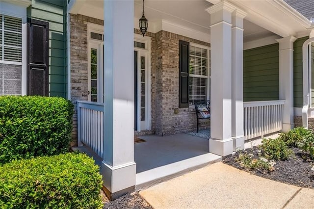 entrance to property with a porch