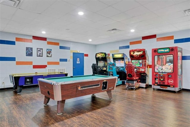 rec room featuring a paneled ceiling, dark hardwood / wood-style floors, and pool table