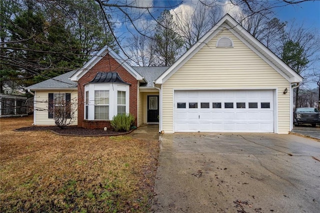 single story home featuring a garage