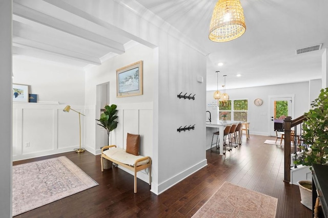 178 Crestbrook Way, Dallas, GA 30157 - corridor featuring a chandelier, a decorative wall, dark wood-style flooring, recessed lighting, and ornamental molding