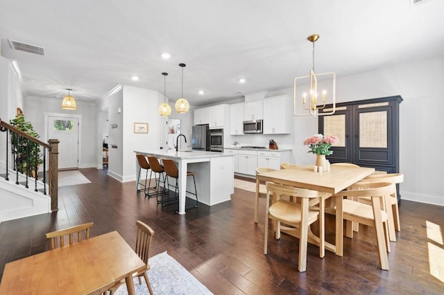 178 Crestbrook Way, Dallas, GA 30157 - dining room featuring a chandelier, recessed lighting, stairs, baseboards, and dark wood-style flooring
