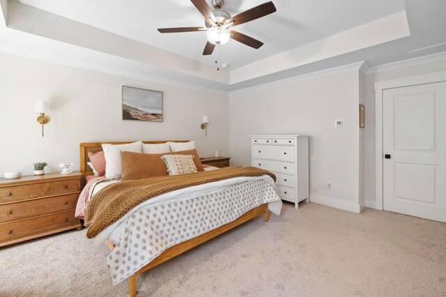 178 Crestbrook Way, Dallas, GA 30157 - carpeted bedroom featuring a tray ceiling, baseboards, a ceiling fan, and ornamental molding