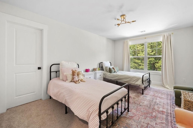 178 Crestbrook Way, Dallas, GA 30157 - bedroom featuring light colored carpet and a chandelier