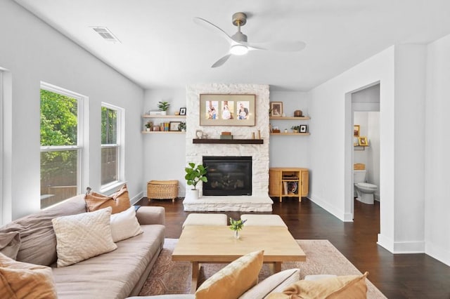 178 Crestbrook Way, Dallas, GA 30157 - living area with a stone fireplace, a ceiling fan, baseboards, and dark wood-style floors