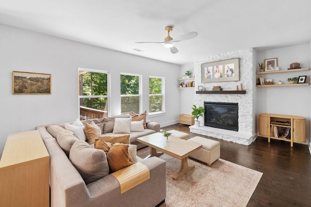 178 Crestbrook Way, Dallas, GA 30157 - living area featuring ceiling fan, a stone fireplace, and dark wood-type flooring