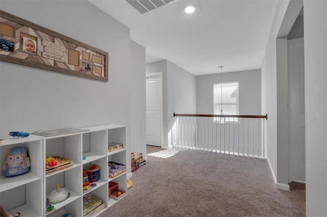 recreation room with carpet