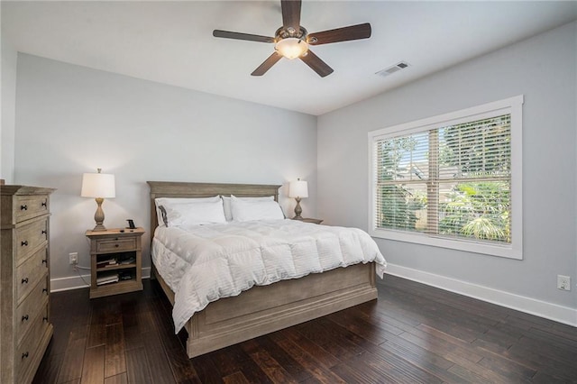 bedroom featuring dark wood-type flooring and ceiling fan