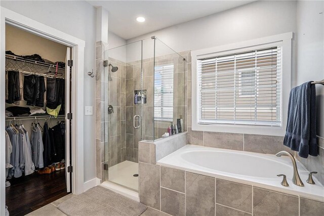 bathroom with plus walk in shower