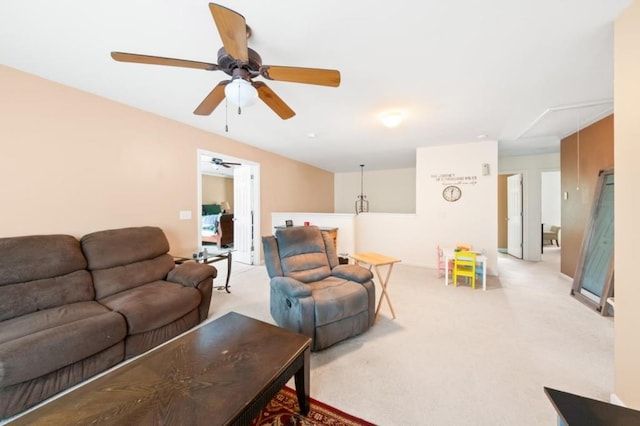 carpeted living room featuring ceiling fan