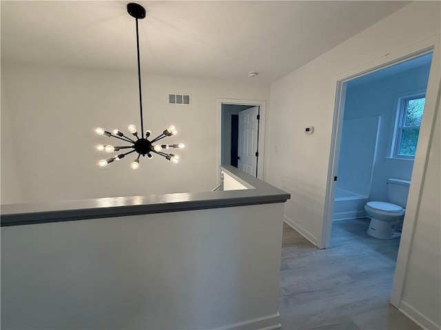 hall featuring light hardwood / wood-style flooring