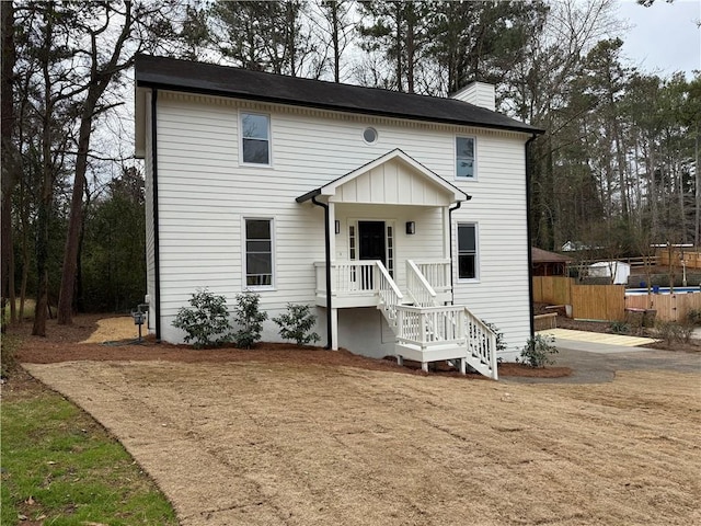 view of front of property featuring a trampoline