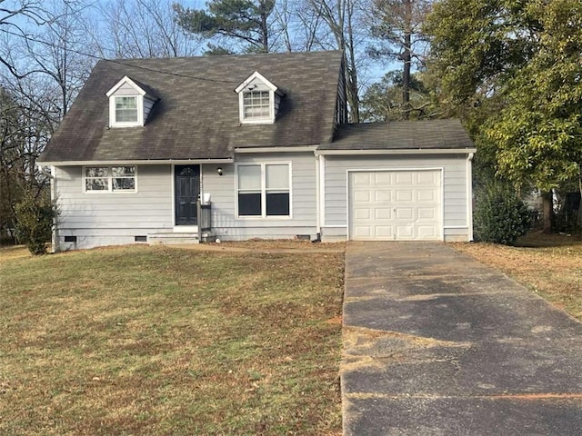 new england style home featuring a garage and a front yard