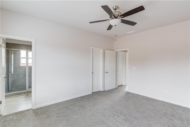 empty room with light carpet and ceiling fan