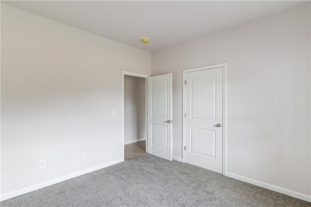 unfurnished bedroom featuring carpet flooring