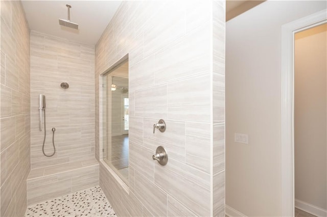 bathroom featuring tiled shower