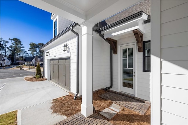 property entrance with a garage