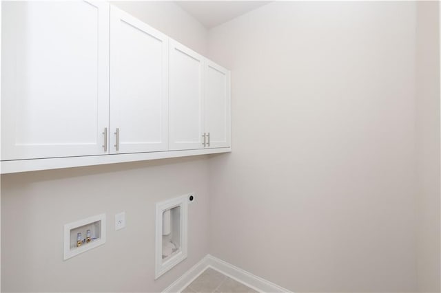 clothes washing area with cabinets, hookup for a washing machine, and hookup for an electric dryer