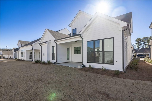 view of front of property featuring a patio