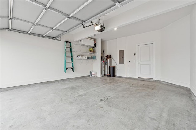 garage featuring a garage door opener, electric panel, and baseboards
