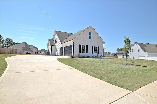 modern farmhouse style home featuring a front lawn