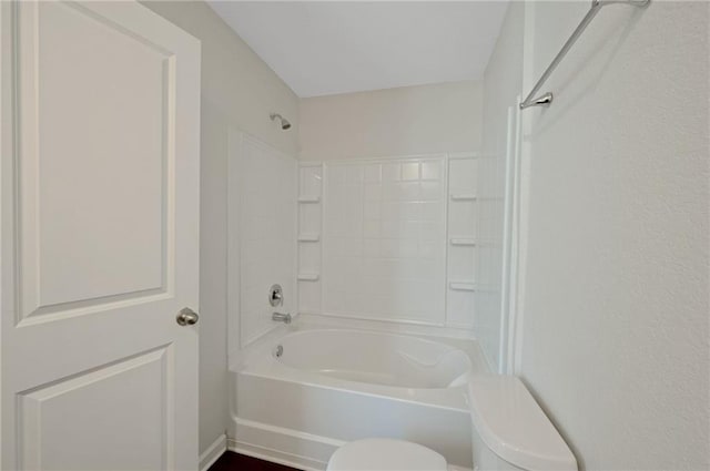 10814 Wheeler Trce, Hampton, GA 30228 - bathroom featuring toilet and shower / washtub combination