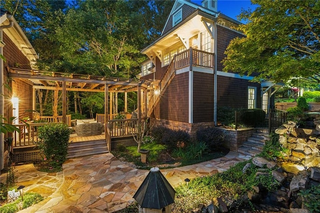 view of property exterior featuring a pergola