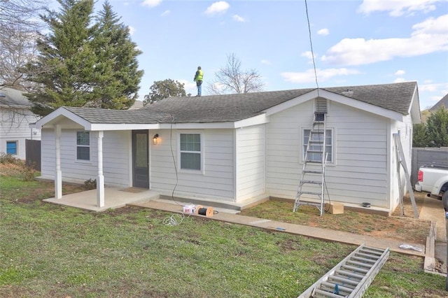 view of front of home featuring a patio area and a front yard