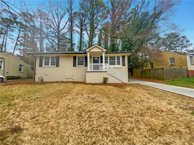 view of front of property with a front lawn