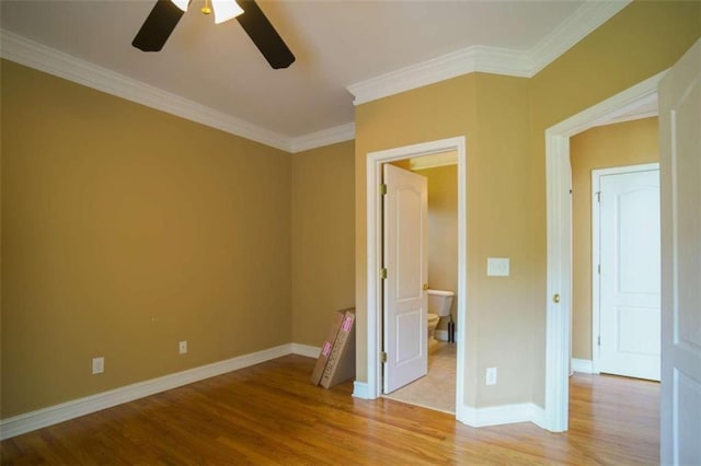 unfurnished bedroom with ornamental molding, light hardwood / wood-style flooring, and ceiling fan